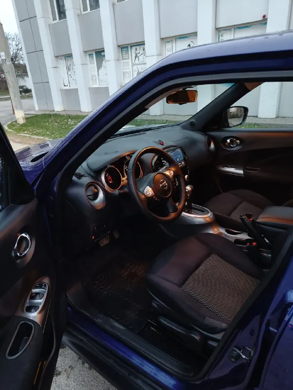 Nissan juke рестайлинг 2014г (таганрог). собственник! коробка - полноценный автомат, не вариатор! хорошая комплектация (климат, подогревы, режимы езды, мультируль и т. д.). в фарах вместо штатных линз bi-led модули, магнитола teyes с камерой заднего вида, новый акум. 2 комплекта резины. 1220000 руб 89604657463 - фотография - 5