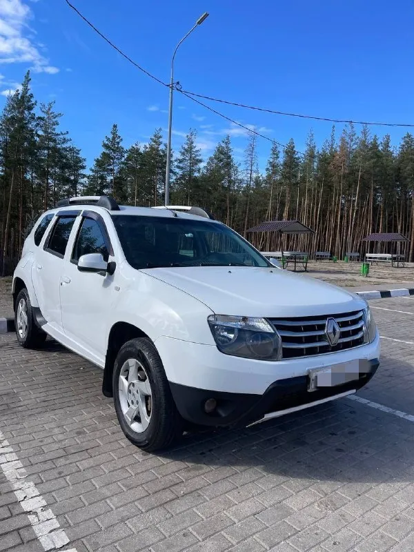Renault duster 2.0 на полном приводе автомат цена 945 тыс руб торг. а красивом белом цвете 2014 года... - фотография