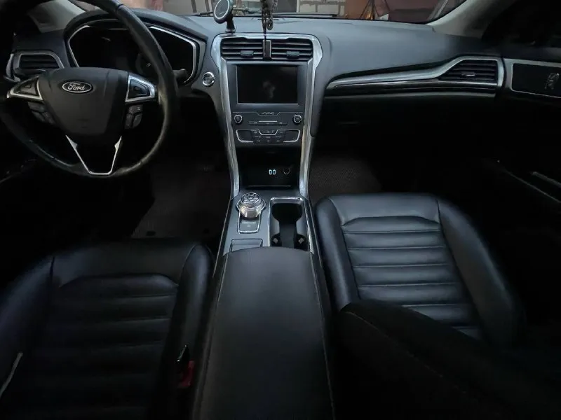 Ford fusion 2019 sel 1.5 ecoboost (184 л. с.) 1 владелец, в собственности 2 года. пробег 190 000 км. отличное состояние. кузов в родной краске. двигатель 2021 года, классический автомат (не робот). комплектация: кожа, люк, подогрев сидений, sync 3, carplay/android auto, адаптивный круиз, камера, парктроники, контроль слепых зон. обмен — только с доплатой от 950 000 ₽. автотека по запросу. осмотр: ростов-на-дону, западный. цена: 1 550 000 ₽ срочно. тел. : +7 (989) 533-08-66 вк: vk. ru/id138489116 - фотография - 5