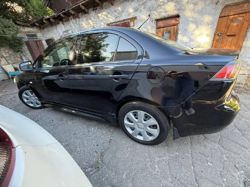 Здравствуйте! mitsubishi lancer x цена: 920 000р город: мариуполь год выпуска: 2011 пробег: 105 000км двигатель: 1.5 топливо: бензин кпп: автомат собственник: да телефон: +79497067554 максимальная комплектация с двигателем 1, 5! покупали на официальном диллере мицубиси!сделано полное to!bluetooth, 5-air bag srs, климат-контроль, громкая связь, управление магнитолой и телефоном на руле, ксенон и т. д! небольшой расход топлива!отличное состояние! - фотография - 3