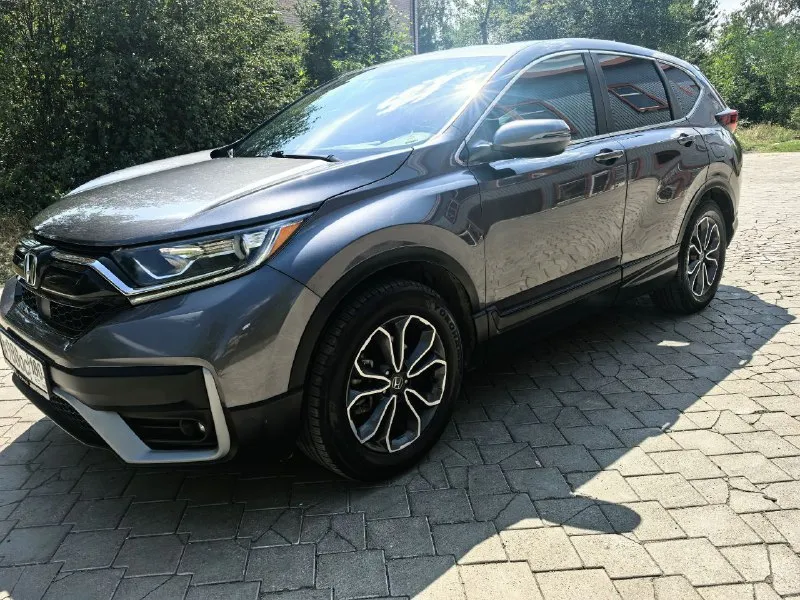 Honda cr-v 2021г рестайлинг ✅ машина в идеальном состоянии, любые проверки ✅пробег 60 000 км ✅ 2hkrw1h85mh428998 ✅ двигатель 1.5 бензин турбо ✅ коробка -вариатор автомобиль полностью обслужен цвет серый. 190 л. с расход: город 8л по трассе 6 л. максимальная комплектация очень динамичный автомобиль 2 ключа, apple car play/ android avto не одна деталь не крашена стекла все оригинальные безопасность вся целая интерьер темный натуральная кожа люк комфорт автозапуск двигателя круиз-контроль управление мультимедиа с руля, электропривод багажника, русифицирована. обогрев сидений лобового стекла зеркал климат контроль машина приехала из сша в августе 2024 г в августе можно переоформлять 2 машина в семье цена : 2 930 000 разумный торг +7 949 628 17 60 - фотография - 2