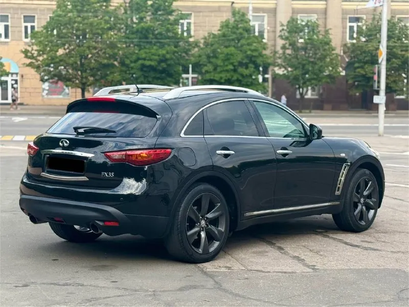 Infinity fx35 цена 1.785.000 номер: +79496358178 автомобиль в идеальнейшем состоянии вложений не требует от слова совсем замена масла каждые 6 тысяч км мотор 3.5 бензин работает как часы, не дымит и не троит коробка автомат, переключает плавно, без дёрганий и пинков, ходовая часть вся обслужена, за машину не стыдно ! богатая комплектация, без ключевой доступ, кнопка старт стоп, подсветка дверей, память сидений, электро регулировка сидений и зеркал, полный электро пакет, датчик света и дождя, кожаный мультируль с альконтарой, обдув и подогрев сидений, двух зонный климат контроль, хорошая мультимедиа, люк, полный привод - фотография - 3