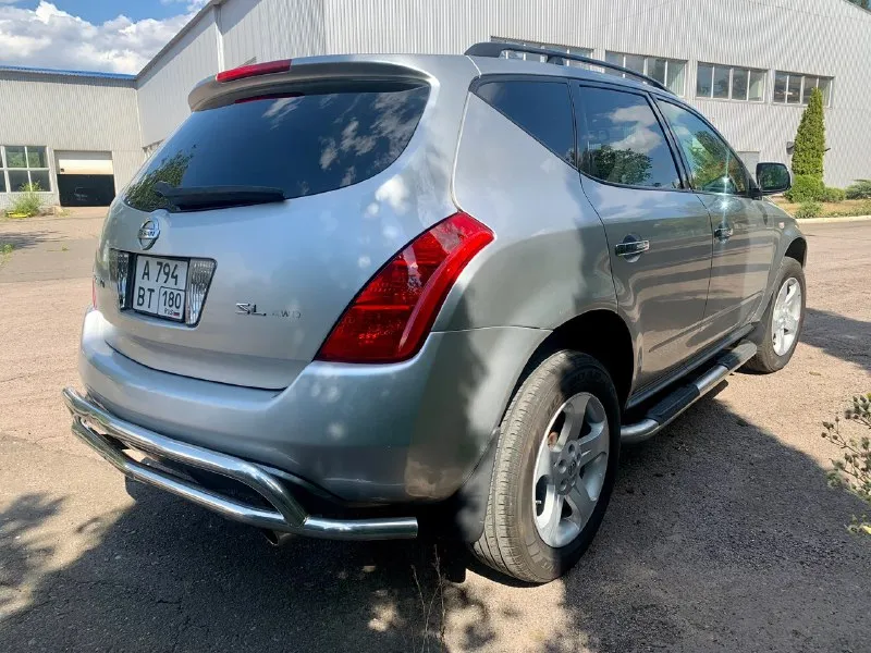 Зверь по цене логана!!! nissan мурано z50 год: 2003 двигатель: бензин 3,5 v6 (установлен контрактный с пробегом на сегодня 97т. км) кпп: вариатор (установлен контрактный, с остатком гарантии на 20месяцев, без учета пробега!!!) двигатель/коробка работают безупречно! расход: город около 14-15. пробег 207000 привод полный климат работает отлично! полный электропакет, память водительского сиденья, пассажирское электрическое, подогревы сидений, зеркал, люк работает, не течет! по кузову есть небольшие возрастные косячки, подкрасы. без дыр, шпакли и прочего. автомобиль - садись и едь! масла везде меняются вовремя и даже раньше регламента! ходовка на отлично!! резина в хорошем состоянии! очень комфортный автомобиль. находится в енакиево, если чего не написал, звоните 7 949 6451601. цена 600 тыс. р. обмен, увы не интересен. торг присутствует но при осмотре авто! 📞 звоните: +7(949)6451601 - фотография - 3