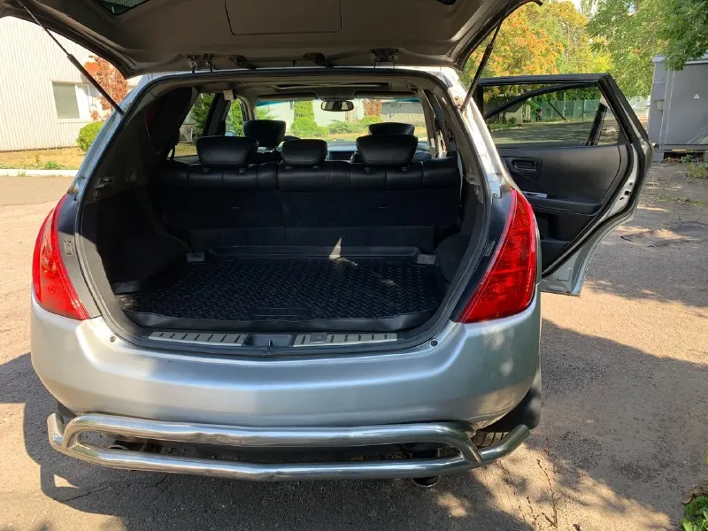 Зверь по цене логана!!! nissan мурано z50 год: 2003 двигатель: бензин 3,5 v6 (установлен контрактный с пробегом на сегодня 97т. км) кпп: вариатор (установлен контрактный, с остатком гарантии на 20месяцев, без учета пробега!!!) двигатель/коробка работают безупречно! расход: город около 14-15. пробег 207000 привод полный климат работает отлично! полный электропакет, память водительского сиденья, пассажирское электрическое, подогревы сидений, зеркал, люк работает, не течет! по кузову есть небольшие возрастные косячки, подкрасы. без дыр, шпакли и прочего. автомобиль - садись и едь! масла везде меняются вовремя и даже раньше регламента! ходовка на отлично!! резина в хорошем состоянии! очень комфортный автомобиль. находится в енакиево, если чего не написал, звоните 7 949 6451601. цена 600 тыс. р. обмен, увы не интересен. торг присутствует но при осмотре авто! 📞 звоните: +7(949)6451601 - фотография - 4