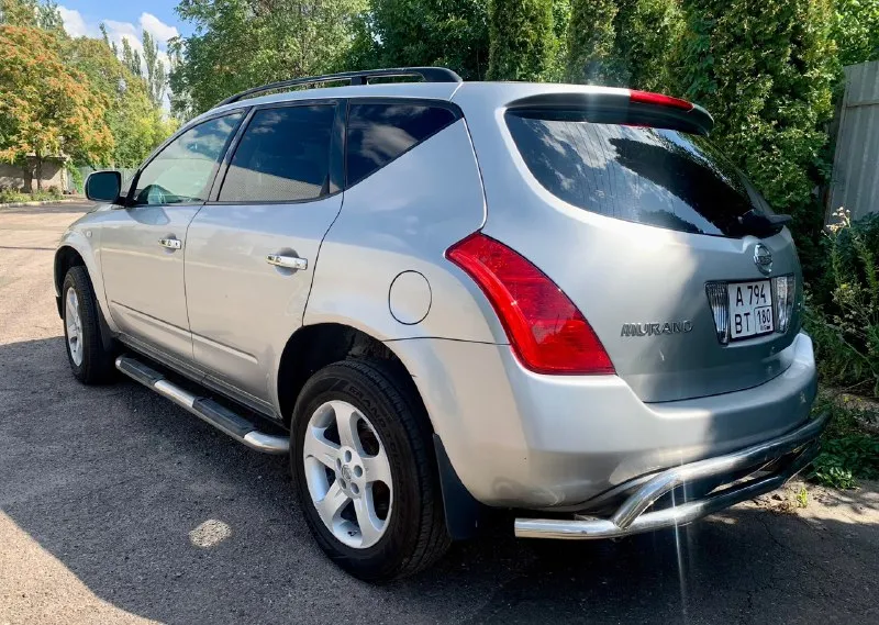 Зверь по цене логана!!! nissan мурано z50 год: 2003 двигатель: бензин 3,5 v6 (установлен контрактный с пробегом на сегодня 97т. км) кпп: вариатор (установлен контрактный, с остатком гарантии на 20месяцев, без учета пробега!!!) двигатель/коробка работают безупречно! расход: город около 14-15. пробег 207000 привод полный климат работает отлично! полный электропакет, память водительского сиденья, пассажирское электрическое, подогревы сидений, зеркал, люк работает, не течет! по кузову есть небольшие возрастные косячки, подкрасы. без дыр, шпакли и прочего. автомобиль - садись и едь! масла везде меняются вовремя и даже раньше регламента! ходовка на отлично!! резина в хорошем состоянии! очень комфортный автомобиль. находится в енакиево, если чего не написал, звоните 7 949 6451601. цена 600 тыс. р. обмен, увы не интересен. торг присутствует но при осмотре авто! 📞 звоните: +7(949)6451601 - фотография - 5