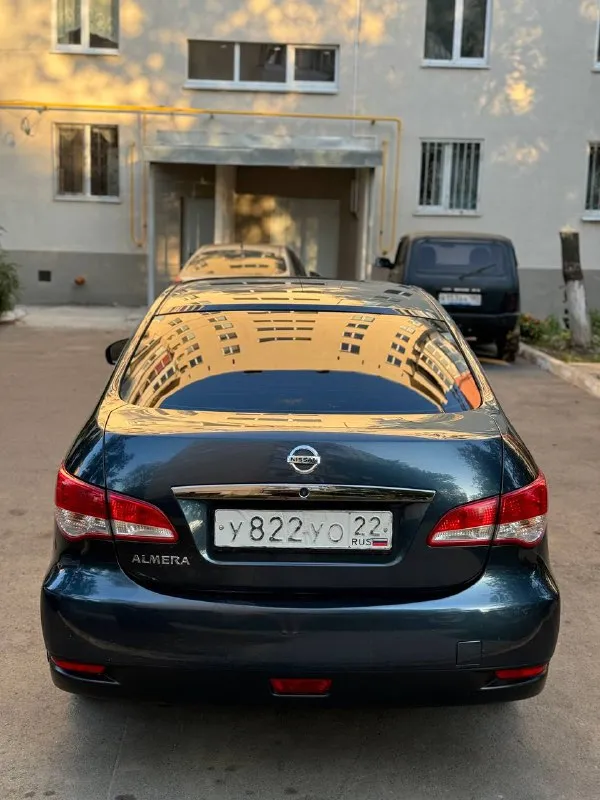 Nissan almera цена - 648.000₽ город - мариуполь год выпуска - 2014 пробег - 148.000 км топливо - бензин модификация- 1.6 кпп - автомат собственник - да +79494572485 птс оригинал 1 владелец!✅ автомобиль в отличном состоянии!!! весной было пройдено то заменены все расходники. кондиционер полностью обслужен месяц назад!за машиной всегда вёлся своевременный уход, денег в авто не жалели! авто полностью обслужено. техника вся на отлично, кузов без гнили, дно идеальное. документы абсолютно чистые доп. инфо. по телефону. эур✅️ abs✅️ кондиционер✅️ эл. подъёмники✅️ подогревы сидений✅ аудио система с bluetooth✅ подушки безопасности ✅️ - фотография - 5