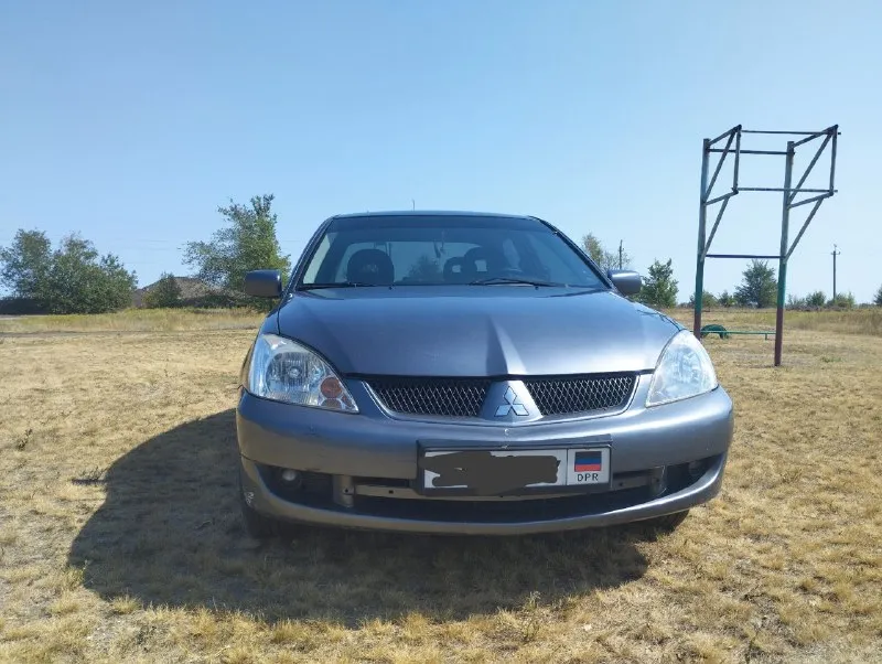 Продам mitsubishi лансер 9.2006г. р объем 1.6.на механике. пробег 193т. км. установлен газ евро 4. р... - фотография