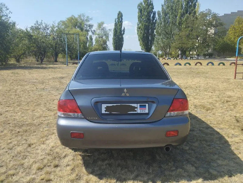 Продам mitsubishi лансер 9.2006г. р объем 1.6.на механике. пробег 193т. км. установлен газ евро 4. резина лето новая, зима на штамповках. обесшумлена, днище и пороги не гнелые. климат контроль. цена 400т. р+торг телефон+7949 403 23 41. авто находится в енакиево. 📞 звоните: +7(949)4032341 - фотография - 2