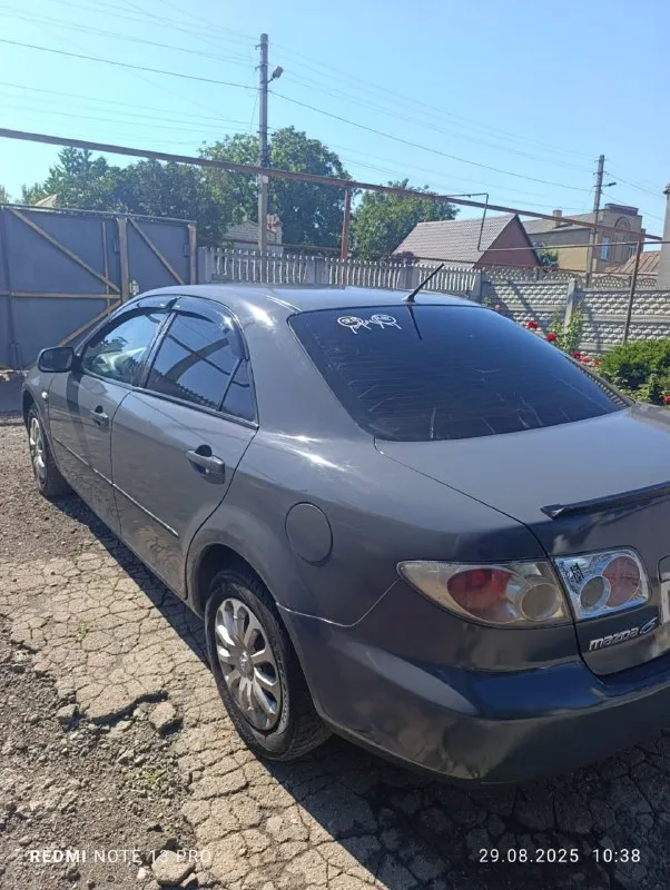 Мазда 6 в цвете шторм-грей 1.8/мкпп/120л. с.машина в хорошем состоянии в 2021году пригнана из европы, сейчас 180 регион. комплектация с кондером, круиз-меню,4стеклоподъемника, рег. руля по высоте и по вылету и т п. , номера кузова читаются, дно и пороги в хорошем состоянии, по мотору нет ни одного потёка, коробка в отличном состоянии, ходовая часть поменялна(стойки, рычаги, наконечники и т п)гур не гудит. есть ошибка по лямде и абс, хотя тормоза поменяны и датчики подключены. ступичные подшипники заменены. ц/замок, сигнализация, остальное по тел: +79494511307 +79493787559 машина в донецке, ориентир донбасс арена. цена :427 тыс. рублей продажа-обмен(предлагайте с вашей доплатой)переоформление по желанию, машина на учёте, штрафов, запретов и ограничений нет, птс, стс, дкп - фотография - 6