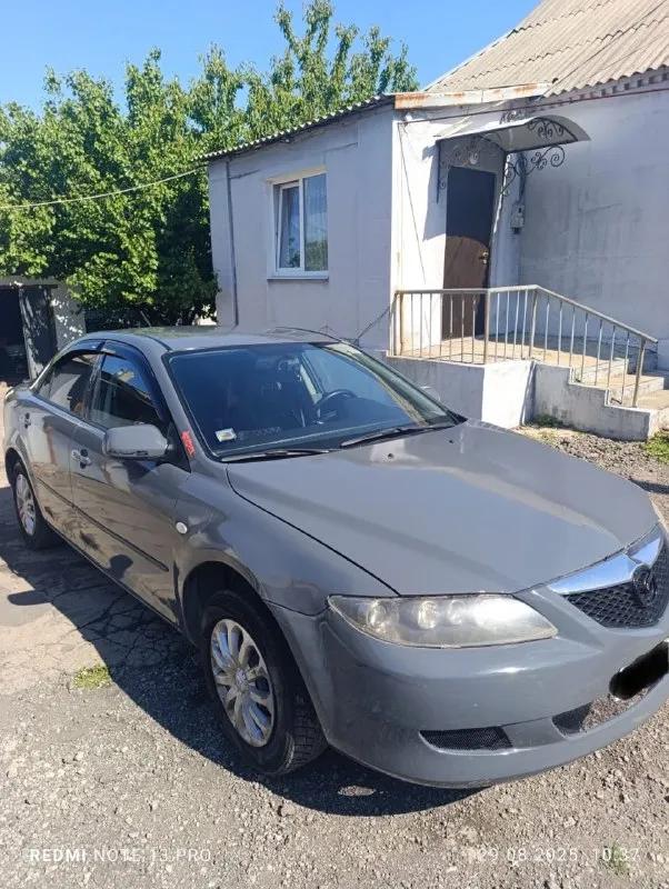 Мазда 6 в цвете шторм-грей 1.8/мкпп/120л. с.машина в хорошем состоянии в 2021году пригнана из европы, сейчас 180 регион. комплектация с кондером, круиз-меню,4стеклоподъемника, рег. руля по высоте и по вылету и т п. , номера кузова читаются, дно и пороги в хорошем состоянии, по мотору нет ни одного потёка, коробка в отличном состоянии, ходовая часть поменялна(стойки, рычаги, наконечники и т п)гур не гудит. есть ошибка по лямде и абс, хотя тормоза поменяны и датчики подключены. ступичные подшипники заменены. ц/замок, сигнализация, остальное по тел: +79494511307 +79493787559 машина в донецке, ориентир донбасс арена. цена :427 тыс. рублей продажа-обмен(предлагайте с вашей доплатой)переоформление по желанию, машина на учёте, штрафов, запретов и ограничений нет, птс, стс, дкп - фотография - 7
