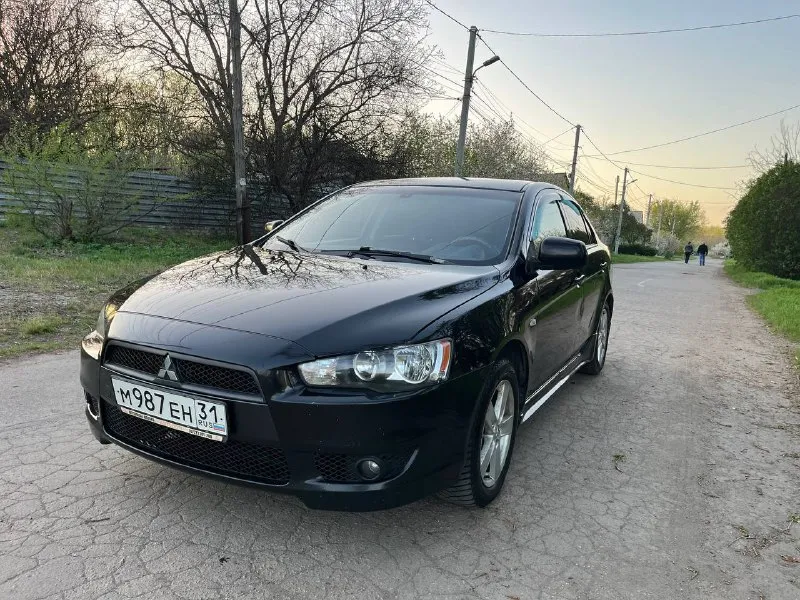 Продам mitsubishi lancer x 1.8 2008 год. 1 владелец с салона ! машина в родном окрасе ( из окраса : косметический окрас левого крыла, правое новое ) с документами полный порядок ! ( кредитов, штрафов, залогов нет ) обслуживалась только у официального дилера ! по машине очень много вложено и сделано - неделю назад поставил новый двигатель ( в отличном состоянии 80т пробега ), новый масляный насос, сразу поставил новый комплект грм ( цепи, натяжители и так далее ) машина всегда обслуживалась качественно и вовремя. автозапуск с ключа. стоит хорошая музыка с блютузом. коробка работают идеально без нареканий ! осмотр донецк. цена : 800 000. торг ! +79494914212 - фотография - 2