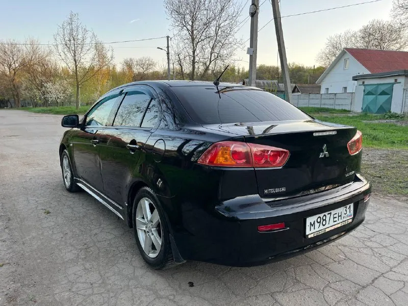 Продам mitsubishi lancer x 1.8 2008 год. 1 владелец с салона ! машина в родном окрасе ( из окраса : косметический окрас левого крыла, правое новое ) с документами полный порядок ! ( кредитов, штрафов, залогов нет ) обслуживалась только у официального дилера ! по машине очень много вложено и сделано - неделю назад поставил новый двигатель ( в отличном состоянии 80т пробега ), новый масляный насос, сразу поставил новый комплект грм ( цепи, натяжители и так далее ) машина всегда обслуживалась качественно и вовремя. автозапуск с ключа. стоит хорошая музыка с блютузом. коробка работают идеально без нареканий ! осмотр донецк. цена : 800 000. торг ! +79494914212 - фотография - 3