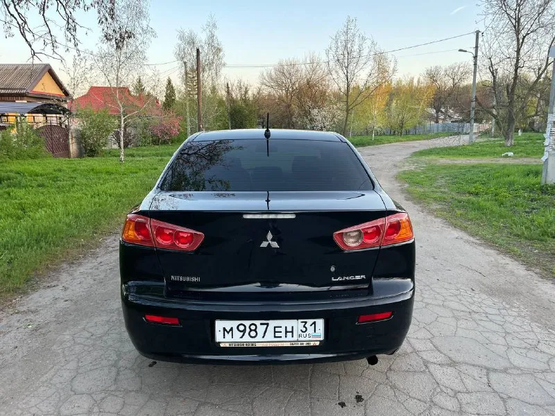 Продам mitsubishi lancer x 1.8 2008 год. 1 владелец с салона ! машина в родном окрасе ( из окраса : косметический окрас левого крыла, правое новое ) с документами полный порядок ! ( кредитов, штрафов, залогов нет ) обслуживалась только у официального дилера ! по машине очень много вложено и сделано - неделю назад поставил новый двигатель ( в отличном состоянии 80т пробега ), новый масляный насос, сразу поставил новый комплект грм ( цепи, натяжители и так далее ) машина всегда обслуживалась качественно и вовремя. автозапуск с ключа. стоит хорошая музыка с блютузом. коробка работают идеально без нареканий ! осмотр донецк. цена : 800 000. торг ! +79494914212 - фотография - 4
