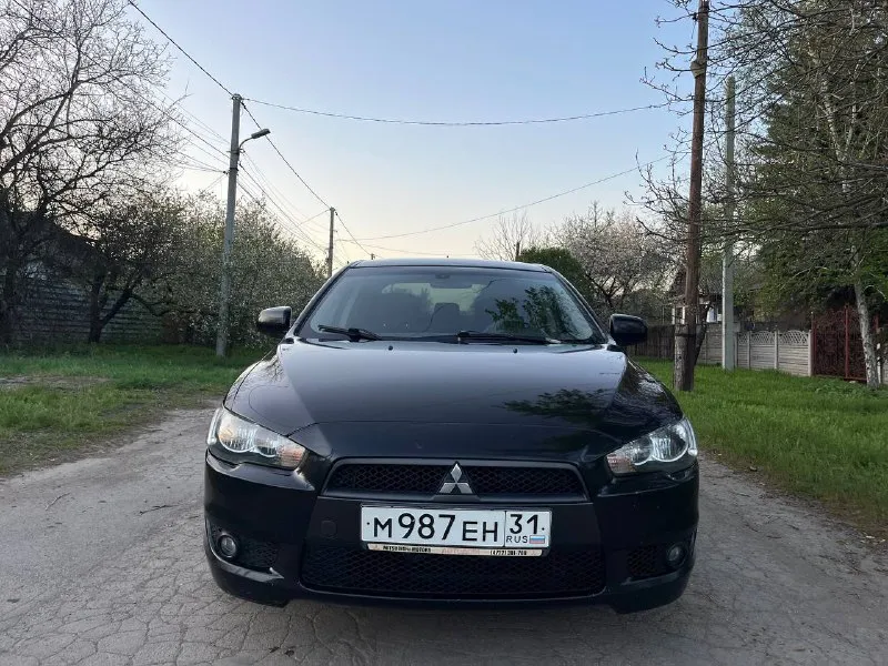 Продам mitsubishi lancer x 1.8 2008 год. 1 владелец с салона ! машина в родном окрасе ( из окраса : косметический окрас левого крыла, правое новое ) с документами полный порядок ! ( кредитов, штрафов, залогов нет ) обслуживалась только у официального дилера ! по машине очень много вложено и сделано - неделю назад поставил новый двигатель ( в отличном состоянии 80т пробега ), новый масляный насос, сразу поставил новый комплект грм ( цепи, натяжители и так далее ) машина всегда обслуживалась качественно и вовремя. автозапуск с ключа. стоит хорошая музыка с блютузом. коробка работают идеально без нареканий ! осмотр донецк. цена : 800 000. торг ! +79494914212 - фотография - 6