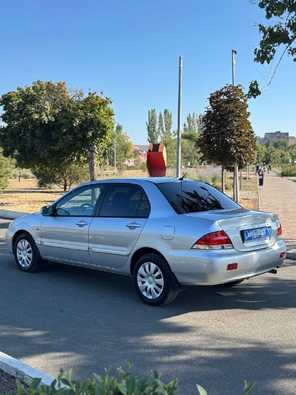 🇯🇵 mitsubishi lancer 9 rest 💰цена: 590 000р 🏢город: мариуполь 📅год выпуска: 2006 🧾пробег: 221 023 км. ⚙️двигатель: 1.6 ⛽топливо: газ/бензин ⚙️кпп: автомат 📞 телефон: +7-949-551-91-52 +7-989-263-55-56 +7-949-727-41-51 💾 описание: ✅ оснащен надежным двигателем 4g18 ✅ 3 владельца, птс оригинал ✅ установлено гбо ✅ кузов без коррозии и дтп, несколько косметических окрасов комплектация 👍: кондиционер ❄️, центральный замок, сигнализация, подогрев сидений, кожаный руль, полный электропакет, магнитола с вluеtооth. улица шевченко 269 ⚠️бесплатно доставим этот или другой автомобиль в донецк, макеевку, бердянск, мелитополь и другие города новых территорий после детального видеообзора со всевозможными диагностиками⚠️ 🏦 возможна продажа в кредит по двум документам. - фотография - 4