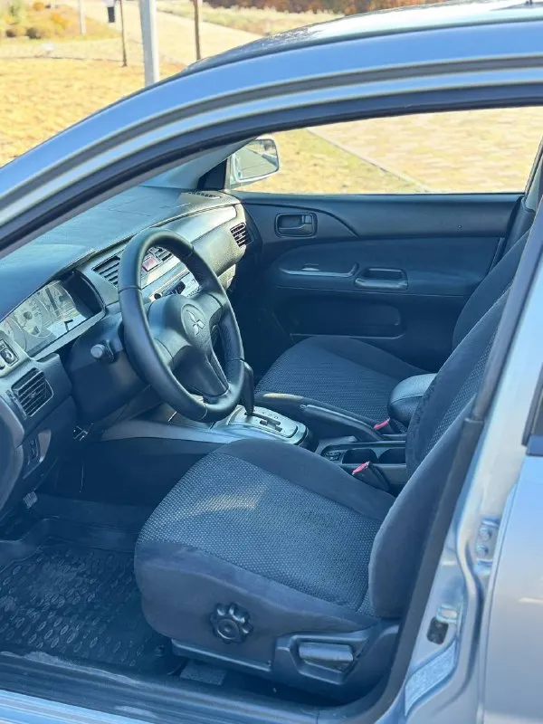 🇯🇵 mitsubishi lancer 9 rest 💰цена: 590 000р 🏢город: мариуполь 📅год выпуска: 2006 🧾пробег: 221 023 км. ⚙️двигатель: 1.6 ⛽топливо: газ/бензин ⚙️кпп: автомат 📞 телефон: +7-949-551-91-52 +7-989-263-55-56 +7-949-727-41-51 💾 описание: ✅ оснащен надежным двигателем 4g18 ✅ 3 владельца, птс оригинал ✅ установлено гбо ✅ кузов без коррозии и дтп, несколько косметических окрасов комплектация 👍: кондиционер ❄️, центральный замок, сигнализация, подогрев сидений, кожаный руль, полный электропакет, магнитола с вluеtооth. улица шевченко 269 ⚠️бесплатно доставим этот или другой автомобиль в донецк, макеевку, бердянск, мелитополь и другие города новых территорий после детального видеообзора со всевозможными диагностиками⚠️ 🏦 возможна продажа в кредит по двум документам. - фотография - 9