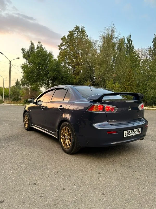 Продам mitsubishi lancer10 2010 год выпуска, мотор 2.0(150л. с.), механика пробег-167.000(родной, не скручен) бензин-газ( зарегистрирован) двигатель и коробка работают идеально! кузов в идеальном состоянии (кузов в заводском окрасе) комплектация: мульти руль, климат контроль, центральный замок, подогрев сидений, полный электро-пакет(4 стеклоподъемника), камера заднего вида, круиз контроль, электро регулировка зеркал,4 подушки безопасности машина местная была куплена в автосалоне нико два комплекта ключей, два комплекта колес цена соответствует состоянию машины, приезжайте смотрите и сами убедитесь, любые проверки на сто за ваш счет цена: 1.100.000.руб +79494335214 📞 звоните: +7(949)4335214 - фотография - 4