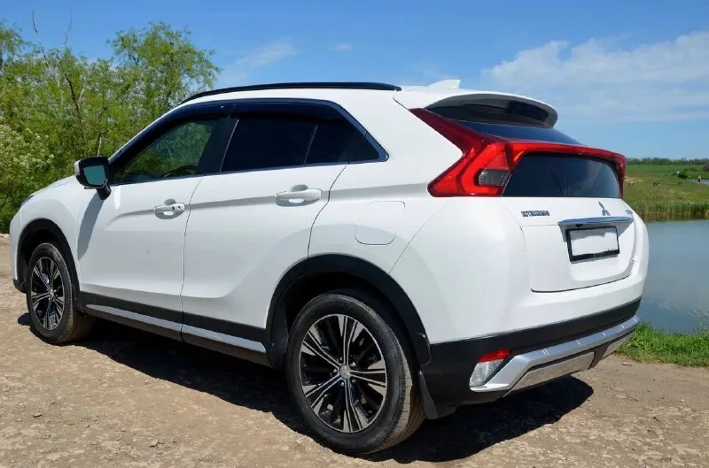 Продам mitsubishi eclipse cross 2019 год, 1.5 турбо в самой максимальной комплектации с панорамой. полный привод s-awc три режима, акпп 8 ст, подрулевые лепестки. заменено масло в акпп оригинал и масло в двигателе, тормозные колодки оригинал в круг поменяны. в машине есть всё, включая проэкцию на стекло, премиум аудио система с сабвуфером rock ford fosgate, активный смарт круиз с полной остановкой, контроль полос, автоматическая экстренная остановка, автоматический дальний/ближний свет, подгревы всех сидений и руля, датчики обгона в зеркалах, радары спереди и сзади, так же много ещё чего. машина очень резвая и экономная, город 8-10л, в зависимости от манеры езды. так же есть режим eco mode в этом режиме расход 6-7 литров. пробег 64 000 миль. цена 2.390🍋торг звонить по номеру +79494013626 📞 звоните: +7(949)4013626 - фотография - 5