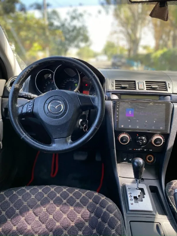 Продается mazda 3 bk 2004 г. в. автомобилем владела моя сестра с 2021 года. покупали в днр. автомобиль привезен из европы, сервисная книжка присутствует. по технике: двигатель работает ровно, не дымит и не троит. масло заливали idemitsu. коробка: 4х ступенчатый автомат, не пинает, переключается плавно. электрика вся работает, подогрев сидений работает. установлена магнитола андроид, из за этого и не работает бортовой компьютер (жк дисплей над магнитолой. штекер от дисплея подключается к родной магнитоле, которую я также отдаю с машиной. если захотите, можете подключить ее и жк дисплей заработает) кондиционер работает, фреон был заправлен 1000 км назад, так как меняли компрессор кондиционера (установлен новый) подвеску и ходовую перебирали. заменили все сайлентблоки, рычаги. при покупки авто, была лопнута задняя левая пружина. заменили задние пружины вместе с задней балкой, так как она была в плачевном состоянии. лично на днях заменил передние рулевые наконечники (2 шт), 📞 звоните: +7(949)3556970 - фотография - 5