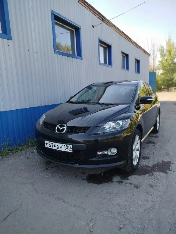 Продам машину в хорошем состоянии. mazda cx7 2008 год 2.3 turbo мотор в отличном состоянии полностью обслужен новые цепи фазорегулятор башмаки натяжители сальники коленвала все запчасти по мотору которые ставил оригинал, все расходники менялись вовремя по мотору не единой капли масла акпп работает исправно раздатка работает исправно авто полный привод по электрике все работает как положено фары отполированы и защищены в броне плёнке капот тоже поклеен пленкой кованый карбон смотрится очень круто по ходовой части все отлично колеса r19 зимние шины одам в подарок авто лично мое не перекуп более подробно за информацией звонить по номеру 👇 +79493795882 дмитрий цена 💸 за машину 1.1 🍋 хорошим людям торг. 📞 звоните: +7(949)3795882 - фотография - 3