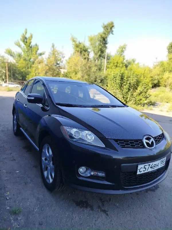 Продам машину в хорошем состоянии. mazda cx7 2008 год 2.3 turbo мотор в отличном состоянии полностью обслужен новые цепи фазорегулятор башмаки натяжители сальники коленвала все запчасти по мотору которые ставил оригинал, все расходники менялись вовремя по мотору не единой капли масла акпп работает исправно раздатка работает исправно авто полный привод по электрике все работает как положено фары отполированы и защищены в броне плёнке капот тоже поклеен пленкой кованый карбон смотрится очень круто по ходовой части все отлично колеса r19 зимние шины одам в подарок авто лично мое не перекуп более подробно за информацией звонить по номеру 👇 +79493795882 дмитрий цена 💸 за машину 1.1 🍋 хорошим людям торг. 📞 звоните: +7(949)3795882 - фотография - 4