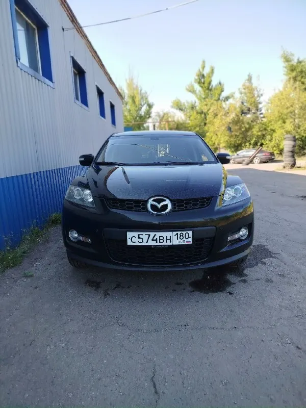 Продам машину в хорошем состоянии. mazda cx7 2008 год 2.3 turbo мотор в отличном состоянии полностью обслужен новые цепи фазорегулятор башмаки натяжители сальники коленвала все запчасти по мотору которые ставил оригинал, все расходники менялись вовремя по мотору не единой капли масла акпп работает исправно раздатка работает исправно авто полный привод по электрике все работает как положено фары отполированы и защищены в броне плёнке капот тоже поклеен пленкой кованый карбон смотрится очень круто по ходовой части все отлично колеса r19 зимние шины одам в подарок авто лично мое не перекуп более подробно за информацией звонить по номеру 👇 +79493795882 дмитрий цена 💸 за машину 1.1 🍋 хорошим людям торг. 📞 звоните: +7(949)3795882 - фотография - 5