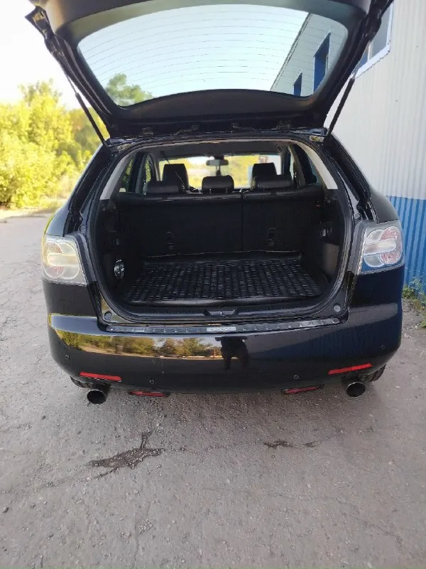 Продам машину в хорошем состоянии. mazda cx7 2008 год 2.3 turbo мотор в отличном состоянии полностью обслужен новые цепи фазорегулятор башмаки натяжители сальники коленвала все запчасти по мотору которые ставил оригинал, все расходники менялись вовремя по мотору не единой капли масла акпп работает исправно раздатка работает исправно авто полный привод по электрике все работает как положено фары отполированы и защищены в броне плёнке капот тоже поклеен пленкой кованый карбон смотрится очень круто по ходовой части все отлично колеса r19 зимние шины одам в подарок авто лично мое не перекуп более подробно за информацией звонить по номеру 👇 +79493795882 дмитрий цена 💸 за машину 1.1 🍋 хорошим людям торг. 📞 звоните: +7(949)3795882 - фотография - 8