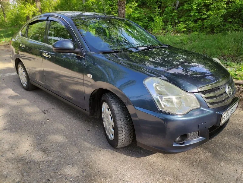 Продам. almera ( автомат)1.6 2014 год. машина не крашена и не подкрашена!обслужена, двигатель k4m са... - фотография