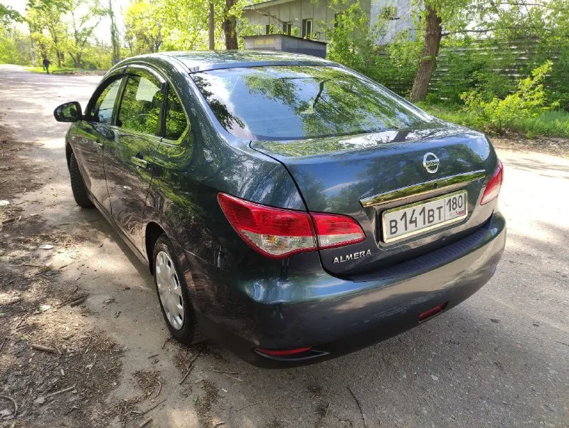 Продам. almera ( автомат)1.6 2014 год. машина не крашена и не подкрашена!обслужена, двигатель k4m самый надежный и неприхотливый с огромным ресурсом, работает без нареканий в штатном режиме, кпп классический надежный автомат ( гидротрансформатор) работает так же без нареканий, салон чистый и ухоженный, большой семейный авто с огромным багажником. в машине работает все! 2 комплекта резины и ключей. полное переоформление в мрэо на вас. из комплектаци : abs, esp, airbag, гур, кондиционер работает !подогрев сидений, подогрев зеркал, подогрев заднего стекла, электро стекла и электро зеркала, камера заднего вида, защита мотора, usb, bluetooth, aux и др. отличнейший автомобиль за эти деньги! цена 840 т. р причина продажи- покупка нового авто. +79497259711 📞 звоните: +7(949)7259711 - фотография - 3