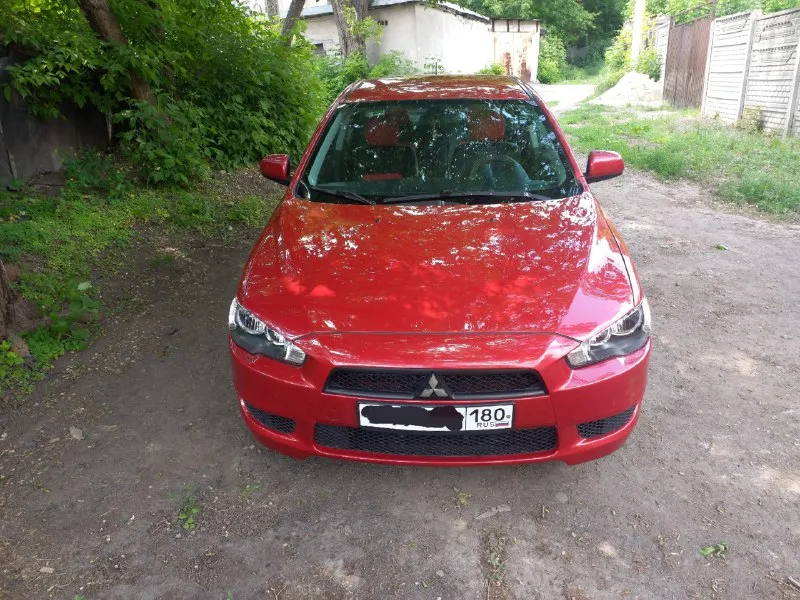Марка. митсубиши лансер. год выпуска 2011. двигатель 1.5 бензин. коробка автомат! пробег 135.000 км.... - фотография