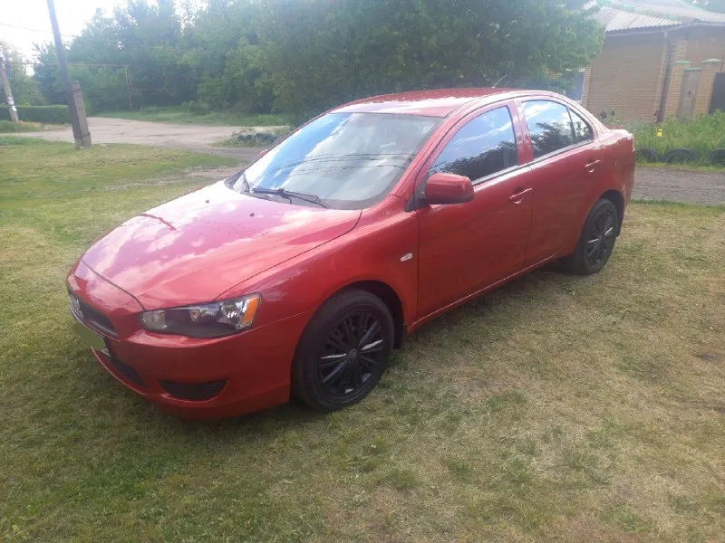 Марка. митсубиши лансер. год выпуска 2011. двигатель 1.5 бензин. коробка автомат! пробег 135.000 км. цена 785.000 рублей. торг. остальные вопросы по +79494463533. макеевка. 📞 звоните: +7(949)4463533 - фотография - 2