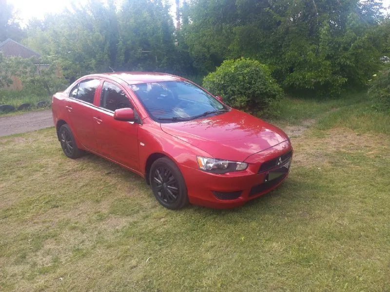 Марка. митсубиши лансер. год выпуска 2011. двигатель 1.5 бензин. коробка автомат! пробег 135.000 км. цена 785.000 рублей. торг. остальные вопросы по +79494463533. макеевка. 📞 звоните: +7(949)4463533 - фотография - 3