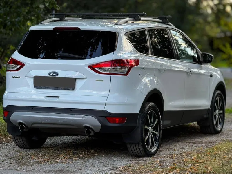 🚗 продам автомобиль ford kuga ▶️ год выпуска: 2013 ▶️ объём двигателя: 1.6 ▶️ комплектация полная ℹ️ описание: ✅ автомобиль в хорошем состоянии. ✅пробег 164.000 ✅ автомобиль без дтп, зеленая автотека и соответсвенно весь кузов и железо ровное! ✅ авто обслужено! не дымит, масло не ест, едет очень бодро. коробка переключается плавна без рывков и пинков, машина внешне в отлично состояние, рыжиков, гнили и т д. вин читается. на любые проверки за ваш счет - готов. 🏛 юридически автомобиль чист, без штрафов 💰 цена🔥:1 млн 100 тыс. рублей торг у капота 🏢 осмотр: донецк ☎ более подробно по номеру телефона: +79494592618 📲 tg: александр 📞 звоните: +7(949)4592618 - фотография - 5