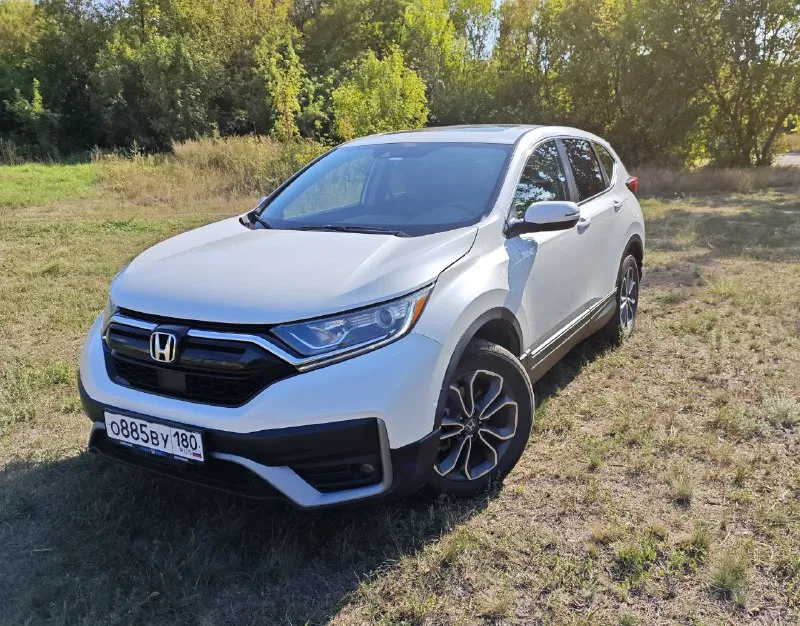 Продам автомобиль honda cr-v 2021 г. в. пробег 76000 объём двигателя 1.5, 190л. с. коробка вариатор, постоянный полный привод, адаптивный круиз контроль, датчики слепых зон, предотвращение выезда с полосы, электронная панель приборов, подогрев передних сидений, безключевой доступ, система start/stop, камера заднего вида, двух-зонный климат контроль, мультируль, полный набор систем активной безопасности, мультимедиа панель, поддержка apple carplay и android auto. прекрасный семейный автомобиль с большим и комфортным салоном. vin - в карусели фото. штрафов / запретов нет цена :2.550.000 осмотр г. енакиево торг у капота +79495002238 - фотография - 3
