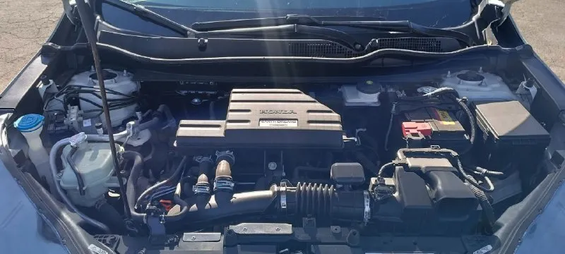 Продам автомобиль honda cr-v 2021 г. в. пробег 76000 объём двигателя 1.5, 190л. с. коробка вариатор, постоянный полный привод, адаптивный круиз контроль, датчики слепых зон, предотвращение выезда с полосы, электронная панель приборов, подогрев передних сидений, безключевой доступ, система start/stop, камера заднего вида, двух-зонный климат контроль, мультируль, полный набор систем активной безопасности, мультимедиа панель, поддержка apple carplay и android auto. прекрасный семейный автомобиль с большим и комфортным салоном. vin - в карусели фото. штрафов / запретов нет цена :2.550.000 осмотр г. енакиево торг у капота +79495002238 - фотография - 9