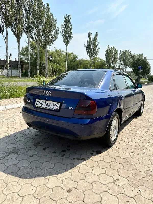Продам audi a4 b5 рестайлинг 1.6mpi 1999 г. в. осмотр г. донецк. пробег: 280000 машина пригнана с германии в 2021 году. обслужена по технике полностью, вырезан катализатор, прошита на евро2 сделан stage1, + отключен клапан evap и egr. ходовая перебрана, коробка механика 5-ти ступка обслужена, заменён комплект сцепления. климат работает без нареканий, отремонтированный прошлым летом компрессор кондиционера. заменены тормозные диски в круг, передние суппорта перебраны, задние заменены на новые. установлены bi-led модули свет шикарный. перетянут потолок и дверные карты, сиденья не продавленные в отличном состоянии. присутствуют временные нюансы по кузову, критичного ничего. 2 комплекта резины зима-лето. установлена сигнализация пандора с автозапуском с телефона. так же отдам новые запчасти. цена: 420.000 тыс. торг у капота. +79493679161 📞 звоните: +7(949)3679161 - фотография - 2