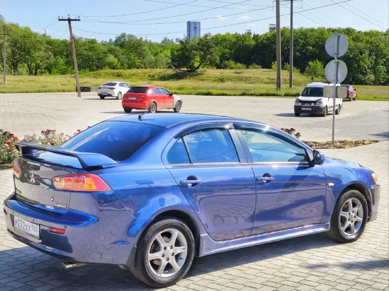 Mitsubishi lancer x 2008 года выпуска с пробегом 214 000 км предлагается к продаже. автомобиль оснащён надёжным атмосферным двигателем объёмом 1.8 литра, который работает ровно, без перебоев, не дымит и обеспечивает отличную тягу. коробка передач — вариатор, функционирует безупречно. в комплектации присутствуют климат-контроль, датчики света и дождя, а также мультимедийная система с навигацией. кузов автомобиля находится в отличном состоянии, без следов коррозии или повреждений, как видно на фотографиях. продажа осуществляется от собственника, желающие могут осмотреть автомобиль в городе донецке. ‎цена 825.000 руб. торг серьёзным покупателям. для связи используйте номер телефона: ‎ +79490454766.(miranda) +79498069344. (+7telekom) telegram +79915588803 ‎ - фотография - 2