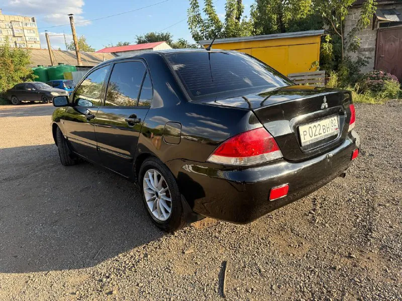 Продам mitsubishi lancer 9 2006 г. в. пробег: 264.000 км объем: 1.6 ат цена: 300000 пока есть мой вариант контакты: +79496990216 в техническом плане без нареканий, по кузову есть возрастные проблемы они видны на фото. по электрике все работает. - мультимедиа с блютуз; - подогрев передних сидений, заднего стекла, зеркал заднего вида; - 4 стеклоподъемника; - кожаный руль; - фотография - 3