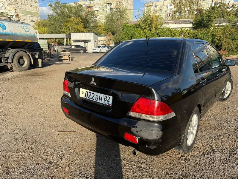 Продам mitsubishi lancer 9 2006 г. в. пробег: 264.000 км объем: 1.6 ат цена: 300000 пока есть мой вариант контакты: +79496990216 в техническом плане без нареканий, по кузову есть возрастные проблемы они видны на фото. по электрике все работает. - мультимедиа с блютуз; - подогрев передних сидений, заднего стекла, зеркал заднего вида; - 4 стеклоподъемника; - кожаный руль; - фотография - 6