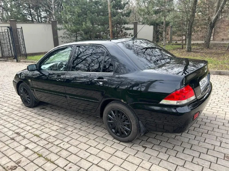 Mitsubishi lancer 1.6 год выпуска: 2007 двигатель: 1.6 л коробка передач: механика привод: передний... - фотография