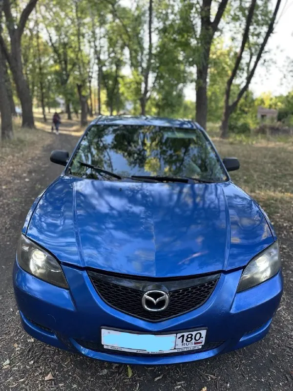 Продам mazda 3 🔥 год выпуска:2004🔥 пробег, км:250000 🔥 модификация:1.6 mт 🔥 тип двигателя:бензин🔥 коробка передач :механика 🔥 привод:передний🔥 тип кузова : легковой седан🔥 koмплeктaция: base🔥 цвет:синий 🔥 в продаже mazda 3 (bk) по низу рынка, на полном ходу. двигатель в превосходном состоянии, запускается с пол оборота в любую погоду, работает ровно, не троит, не дымит, обороты не плавают. тяга бешенная. кпп-работает волшебно, все передачи включатся мягко, без хрустов, ничего не выбивает. ходовая-мячик, дорогу держит уверенно, руль никуда не убигает, едет ровно, не стучит, не бьет. единственное что нужно, это купить скобу на задний левый суппорт, если успею заменю (цена вопроса 50руб). салон в хорошем состоянии для своих лет и цены автомобиля. есть пару моментов, но не критично. по кузову видно на фото, кому нужно видео, предоставлю по запросу. авто зашумлено, так как раньше стояла хорошая музыка. цена:349.999 тысяч возможен пригон по договоренности. возможен обмен. номер для связи:+79495752024 - фотография - 2