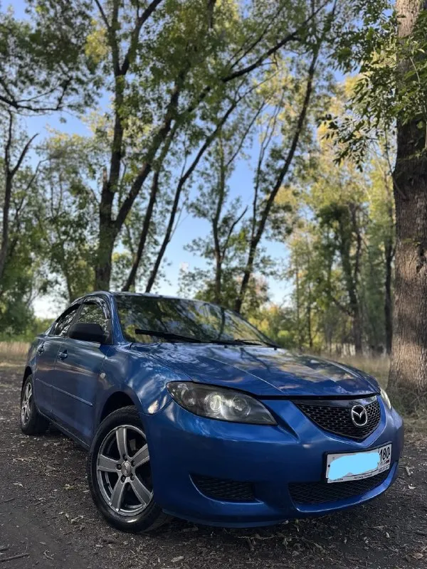 Продам mazda 3 🔥 год выпуска:2004🔥 пробег, км:250000 🔥 модификация:1.6 mт 🔥 тип двигателя:бензин🔥 коробка передач :механика 🔥 привод:передний🔥 тип кузова : легковой седан🔥 koмплeктaция: base🔥 цвет:синий 🔥 в продаже mazda 3 (bk) по низу рынка, на полном ходу. двигатель в превосходном состоянии, запускается с пол оборота в любую погоду, работает ровно, не троит, не дымит, обороты не плавают. тяга бешенная. кпп-работает волшебно, все передачи включатся мягко, без хрустов, ничего не выбивает. ходовая-мячик, дорогу держит уверенно, руль никуда не убигает, едет ровно, не стучит, не бьет. единственное что нужно, это купить скобу на задний левый суппорт, если успею заменю (цена вопроса 50руб). салон в хорошем состоянии для своих лет и цены автомобиля. есть пару моментов, но не критично. по кузову видно на фото, кому нужно видео, предоставлю по запросу. авто зашумлено, так как раньше стояла хорошая музыка. цена:349.999 тысяч возможен пригон по договоренности. возможен обмен. номер для связи:+79495752024 - фотография - 4