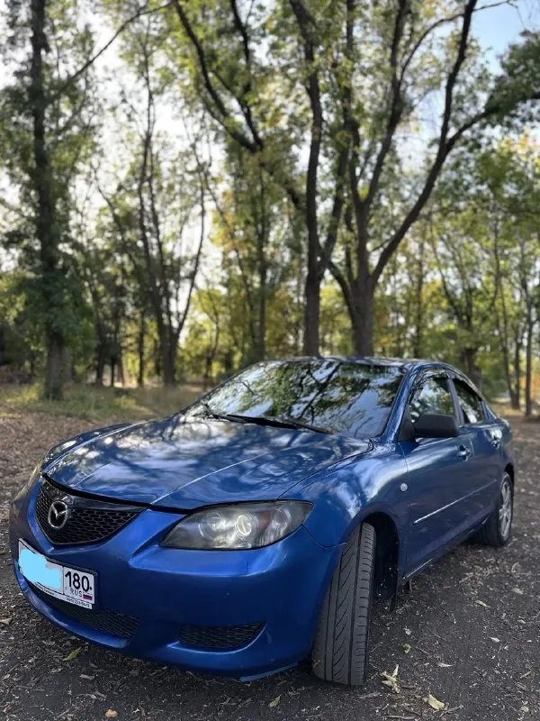 Продам mazda 3 🔥 год выпуска:2004🔥 пробег, км:250000 🔥 модификация:1.6 mт 🔥 тип двигателя:бензин🔥 коробка передач :механика 🔥 привод:передний🔥 тип кузова : легковой седан🔥 koмплeктaция: base🔥 цвет:синий 🔥 в продаже mazda 3 (bk) по низу рынка, на полном ходу. двигатель в превосходном состоянии, запускается с пол оборота в любую погоду, работает ровно, не троит, не дымит, обороты не плавают. тяга бешенная. кпп-работает волшебно, все передачи включатся мягко, без хрустов, ничего не выбивает. ходовая-мячик, дорогу держит уверенно, руль никуда не убигает, едет ровно, не стучит, не бьет. единственное что нужно, это купить скобу на задний левый суппорт, если успею заменю (цена вопроса 50руб). салон в хорошем состоянии для своих лет и цены автомобиля. есть пару моментов, но не критично. по кузову видно на фото, кому нужно видео, предоставлю по запросу. авто зашумлено, так как раньше стояла хорошая музыка. цена:349.999 тысяч возможен пригон по договоренности. возможен обмен. номер для связи:+79495752024 - фотография - 5