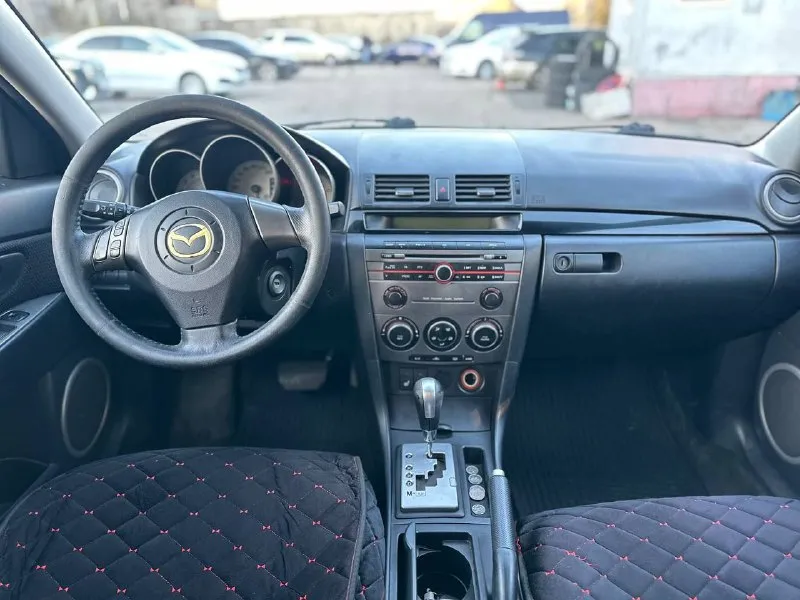 Продам мазда 3, 2007 г. , 1.6 бензин на автомате. пробег 210 тыс. , подтвержденный. по технике все хорошо, мотор тянет бодро, коробка переключает мягко. по кузову есть жизненные моменты, внутри все работает - климат, эл. стеклоподъмники, подогревы сидений. хорошая летняя резина, новый аккумулятор. по документам чистая, переоформление в мрэо без проблем. цена 490.000 руб, торг возле капота. посмотреть можно в центре донецка +79494522484 - фотография - 7
