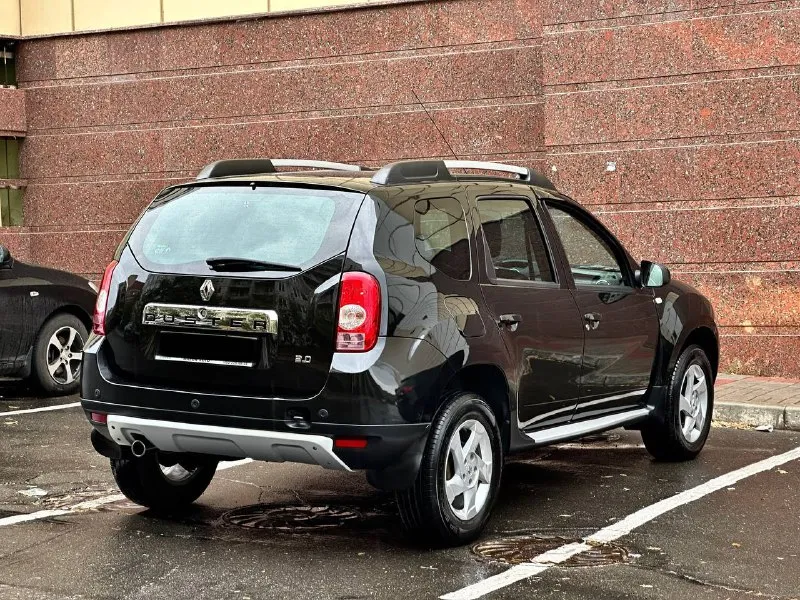 Renault duster год выпуска - 2014 пробег - 70.000км двигатель - 2.0 бензин кпп - автомат цена - 1.135.000₽ тел. +79493902663 либо - +79496799814 автомобиль в шикарном состоянии, без каких либо повреждений или изъянов. двигатель работает тихо и ровно. чистый и ухоженный кожаный салон. всего 2 хозяина. родной пробег. техническая часть на 5+ хорошая комплектация: подогревы всех сидени; кожаный салон; мультируль; отличная акустика; кондиционер; полный бортовой компьютер; abs; airbag; 2 пары ключей. кто ищет достойный дастер с минимальным пробегом - добро пожаловать. свзяь не всегда хорошая, на этих же номерах есть телеграм. 📲 tg: @vladimir_23_23_23 📞 звоните: +7(949)3902663 - фотография - 3