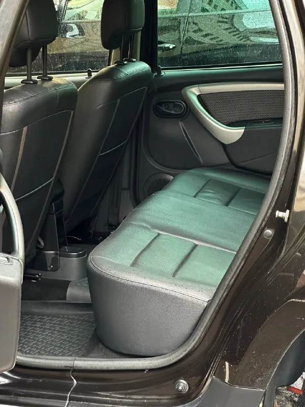 Renault duster год выпуска - 2014 пробег - 70.000км двигатель - 2.0 бензин кпп - автомат цена - 1.135.000₽ тел. +79493902663 либо - +79496799814 автомобиль в шикарном состоянии, без каких либо повреждений или изъянов. двигатель работает тихо и ровно. чистый и ухоженный кожаный салон. всего 2 хозяина. родной пробег. техническая часть на 5+ хорошая комплектация: подогревы всех сидени; кожаный салон; мультируль; отличная акустика; кондиционер; полный бортовой компьютер; abs; airbag; 2 пары ключей. кто ищет достойный дастер с минимальным пробегом - добро пожаловать. свзяь не всегда хорошая, на этих же номерах есть телеграм. 📲 tg: @vladimir_23_23_23 📞 звоните: +7(949)3902663 - фотография - 6