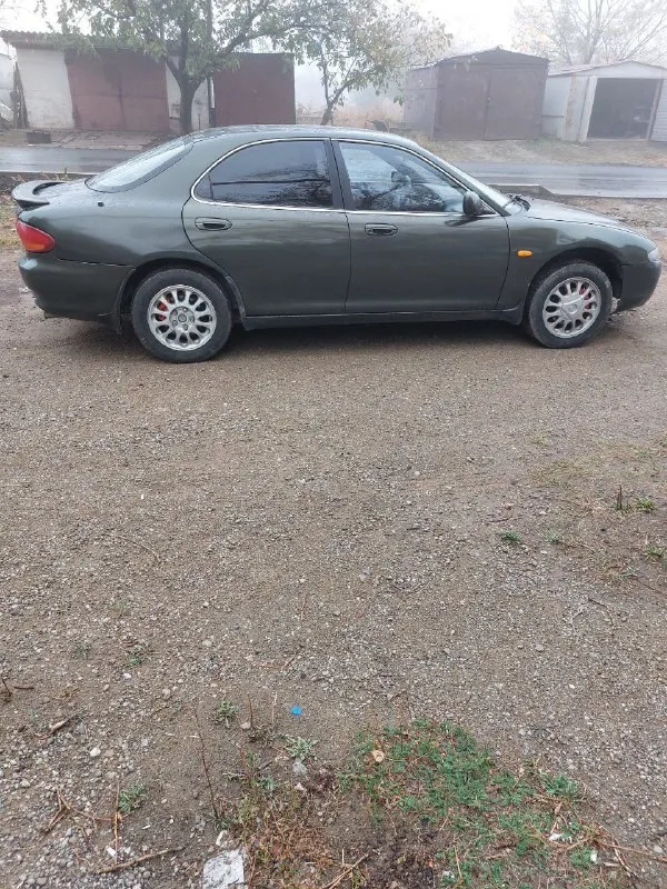 Продам автомобиль mazda xedos 6. в хорошем состоянии, 1999 года выпуска. бензин. кпп - механика. двигатель 1.6 (контрактный) не гнилая, дно и лонжероны целые пробег 240 т. км. цена 250 000 руб. торг уместен. телефон +7949 408 37 85 - фотография - 3