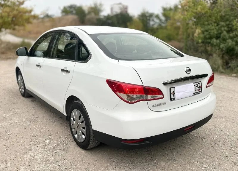 Очень срочноя продажа. такая цена только на выходные цена 799тыс. руб. продаю nissan альмера 2018год. 1.6 автомат пробег 127тыс. км. не бит. не краш.2хозяена газ евро-4 не такси, не каршеринг автомобиль в идеальном состоянии без какаих либо вложений вообще. кузов весь в родном окрасе за исключением одного переднего клыла любые проверки. нет не гнили не ржавчины не царапин не вмятин не сколов выглядит в живую лутще чем на фото и видио. в превосходном состоянии. родной пробег 127тыс. км подтвержденный автотекой. коробка самый обычный автомат айсин 5ст. не пинает не дергает работает как ак47)ходовая тоже в идеальном состоянии. салон как новый. самая полная комплектация для данной модели: кондиционер холодит очень хорошо, гур, подогрев сидений, датчики света и дождя, эл. стекдоподьемники, эл. зеркала с обогревом. также установленно газавое оборудование пропан евро-4. автотека зеленая по запросу могу скинуть автотеку.2сообстаеника. юредически авто чистое. продажа с перелформлен 📞 звоните: +7(949)9706850 - фотография - 4