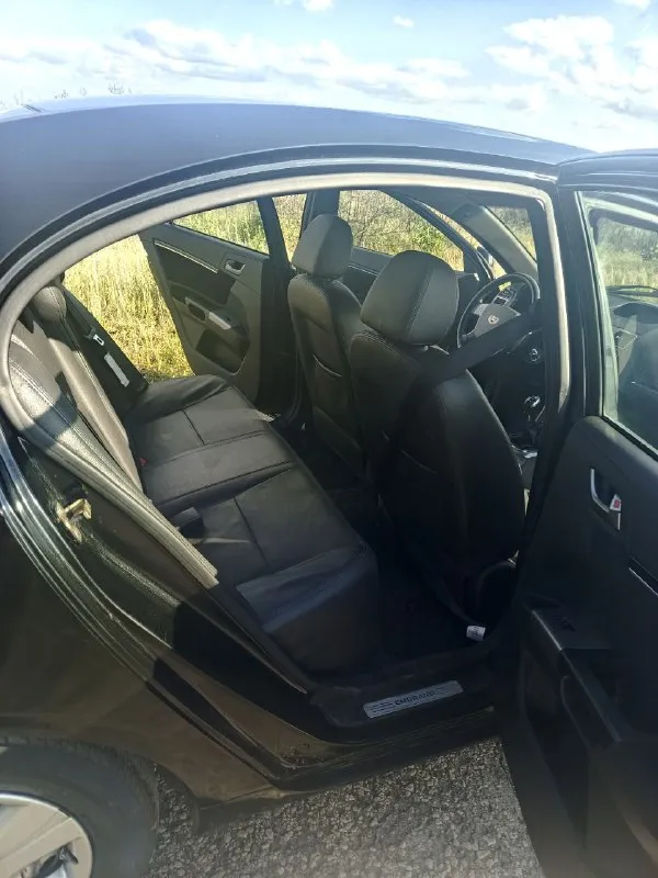 Продаю собственный автомобиль geely emgrand ec-7 fe-1 2014 года выпуска 1.8 мкпп 126 л. с. родной пробег 63 тыс. км второй владелец, сервисное обслуживание (подтверждающие документы). все обслужено, новый акб. abs, кондиционер заправлен и работает, подогревы передних сидений, электростеклоподъемники, электрорегулировка боковых зеркал, подушки безопасности не стреляные, регулировка руля, кожаный салон, 6 штатных динамиков, жк монитор в котором блютуз, aux подключение usb. есть нюансы по лкп и багажнику 510 тыс. руб, небольшой торг у капота +79493357406 осмотр г. кировское. 📲 tg: av 📞 звоните: +7(949)3357406 - фотография - 8
