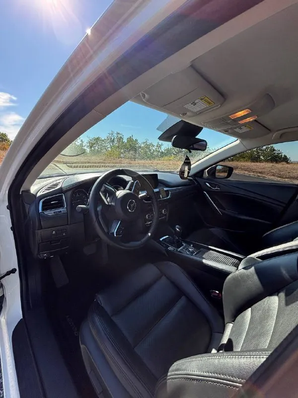 Продам! mazda 6 gj комплектация-touring год - 2017 мотор - 2.5 at пробег - 118000 автомобиль своевременно обслуживается. r-19 диски -двухзонный климат -круиз контроль -обогрев передних сидений -мульти руль - датчики дождя и света - электропривод водительского сиденья -камера заднего вида цена 1990000 хороший торг у капота звоните +79493241169 осмотр г. снежное - фотография - 4